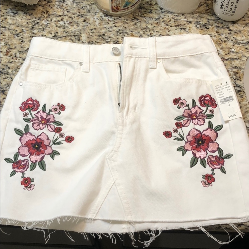 White denim skirt with embroidered flowers